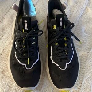Worn once,  s 7.5 , SOREL tennis shoes, black with white tw and yelloww pipping